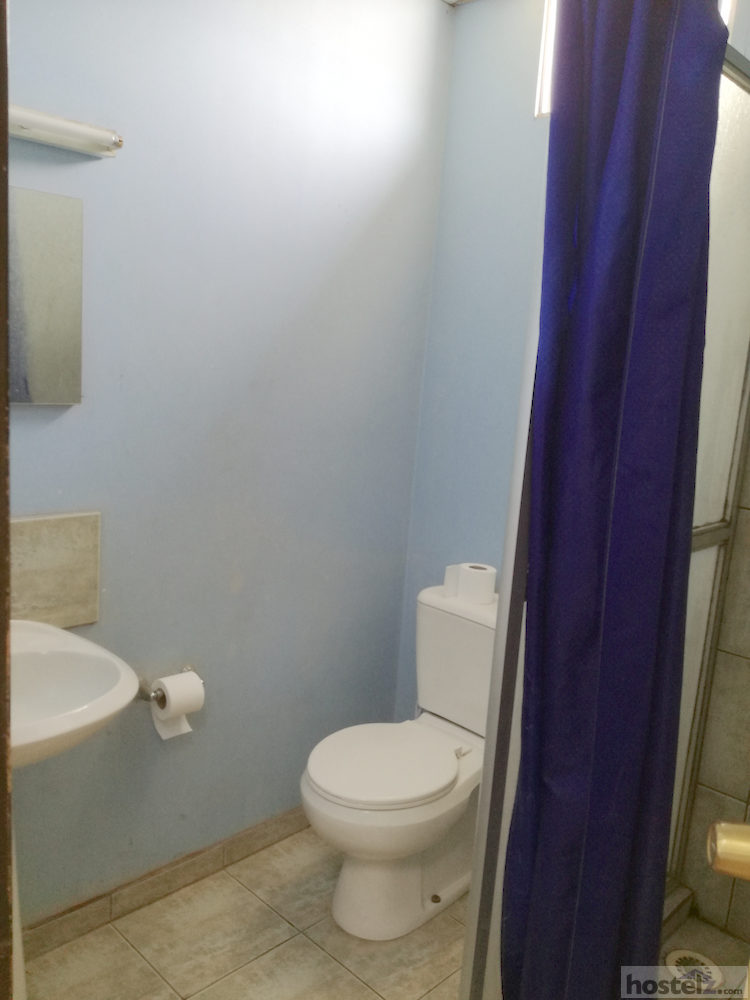En suite bathroom with shower and toilet.