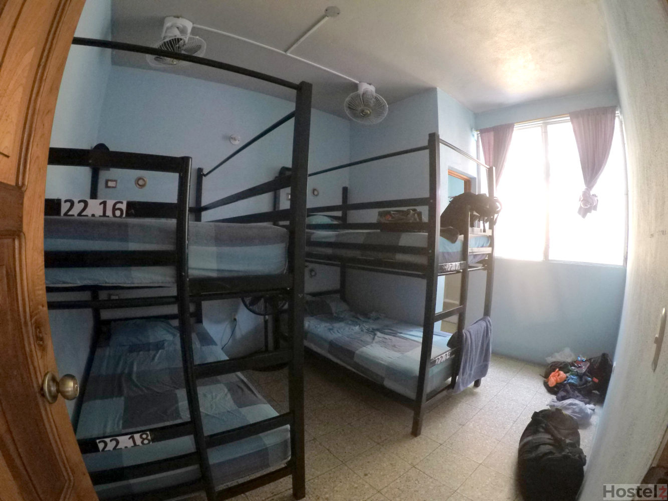 Non-airconditioned 4-bed dorm with fans and en suite bathroom