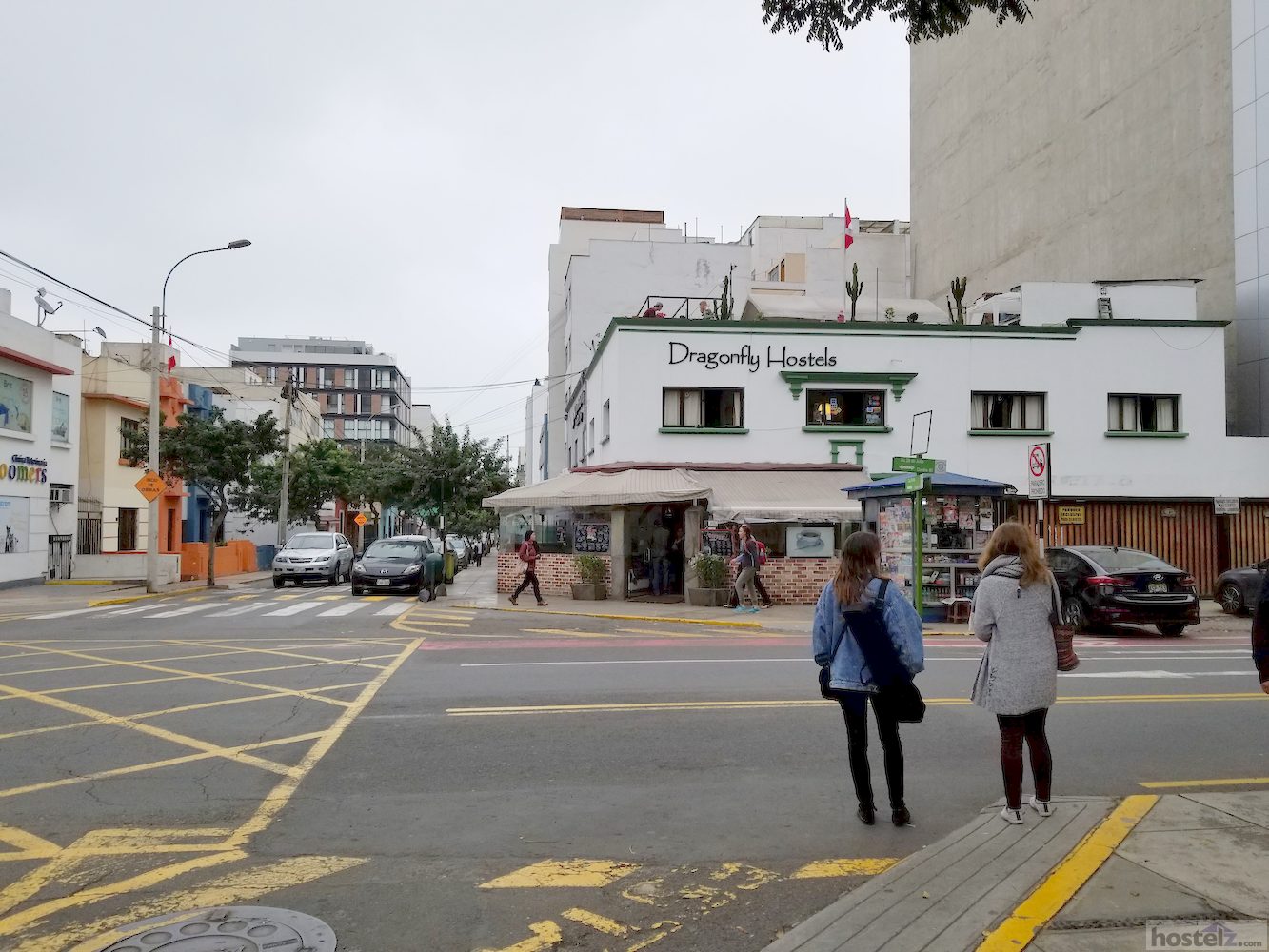 View of hostel and adjacent restaurant from across the street