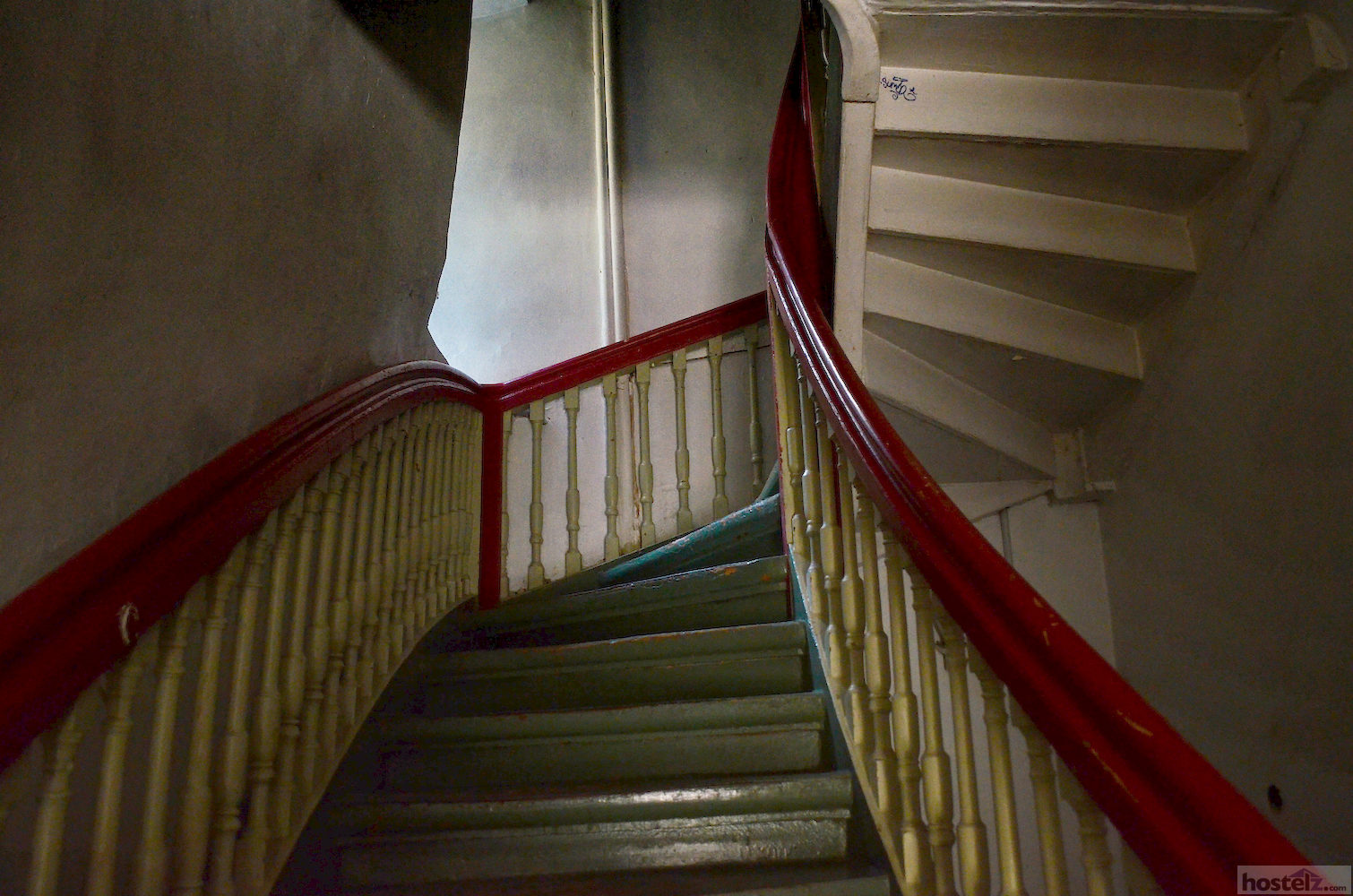 A dark staircase to the hostel