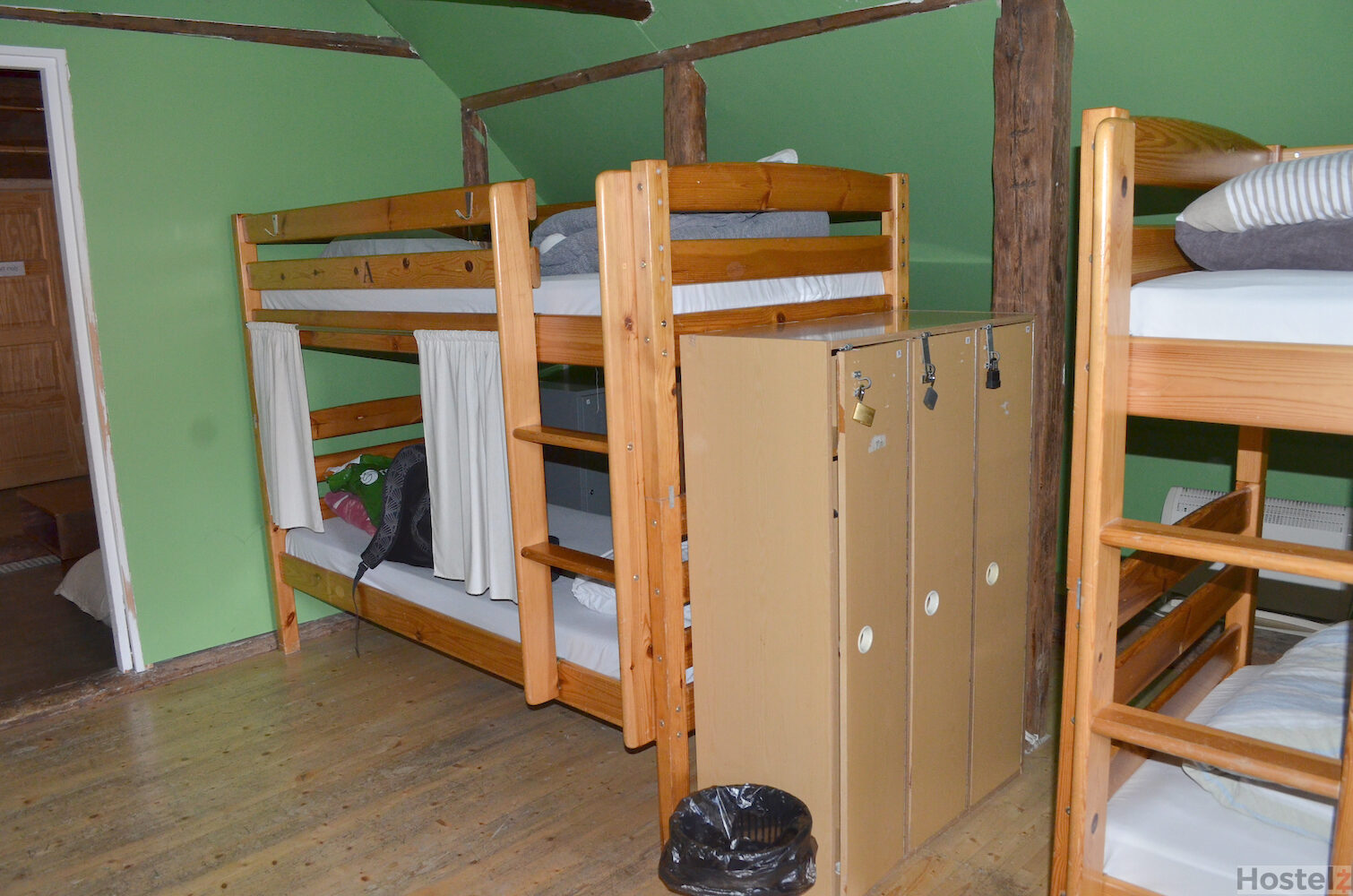 Lockers and bunkn beds in the dorm room in the hostel