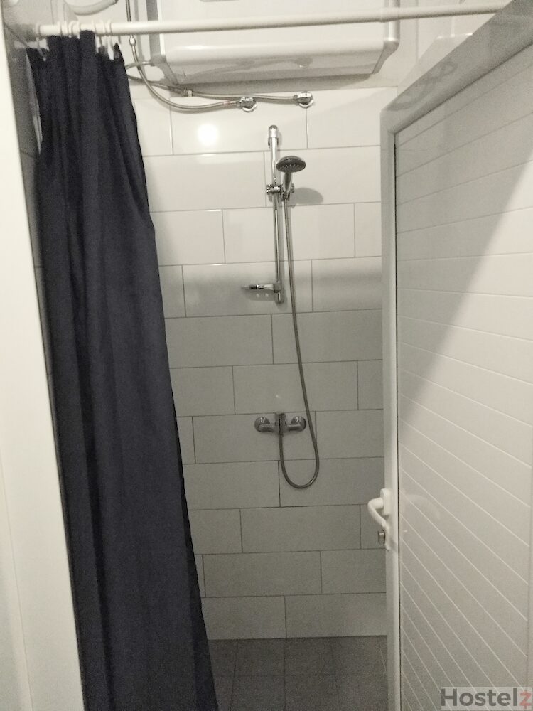 Showers have hot water and plenty of room to change.