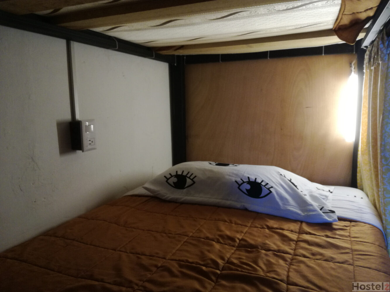 Bunk with light and electrical outlet
