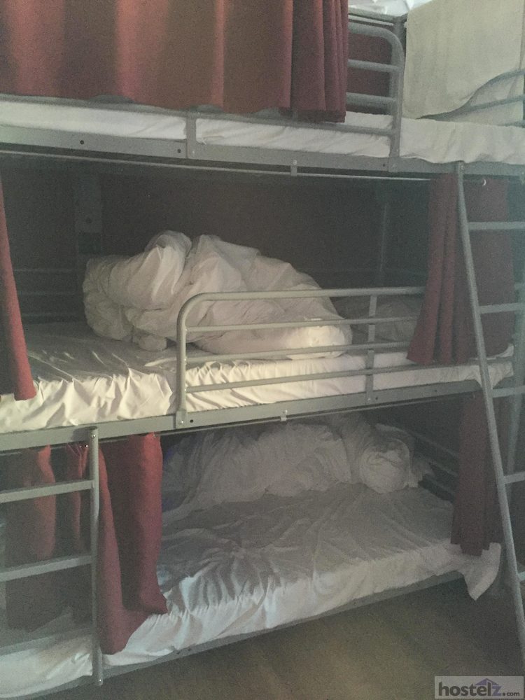 dorm rooms contain triple bunks