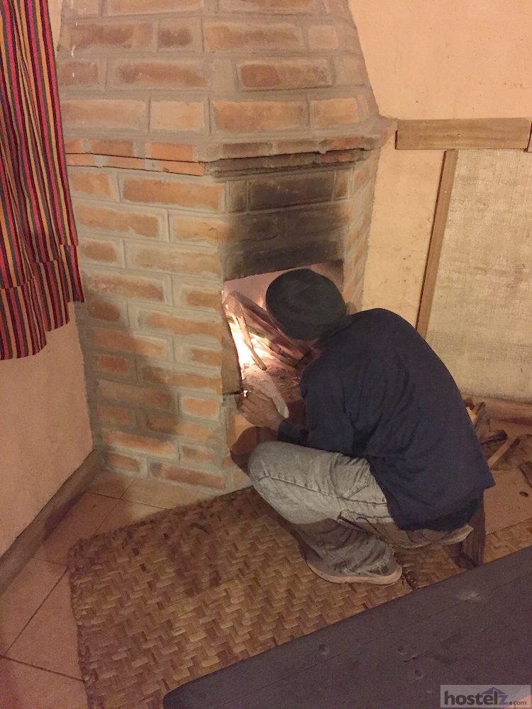 Fire place at the dormitory. Staff can help you to start the fire every night