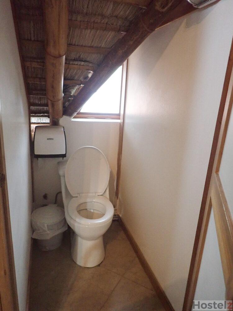 One of the shared toilets for the eight-bed dorms