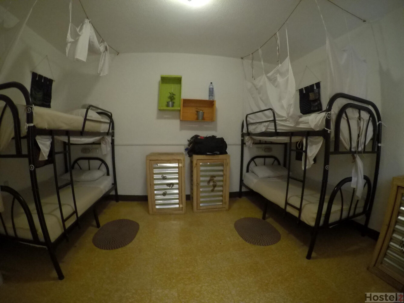 4-bed dorm room with lockers