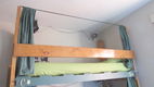 A typical bed in a 4 bed mixed dormitory, 2 powerpoints and a lamp each along with curtains