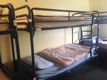 Beds in 10-bed dorm