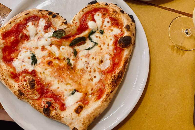 Pizza with heart shape in Rome