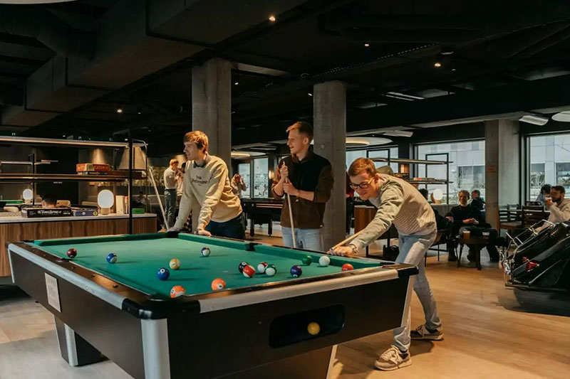 Backpackers playing in a Hostel in Copenhagen